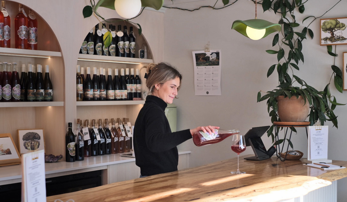 Pouring wine at Dormilona cellar door